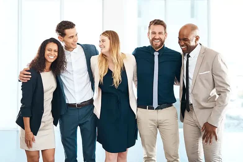business-team-smiling-and-standing-together